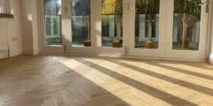 Installation of Project Floors Silvered Oak Herringbone flooring installation in Davenport SK2
